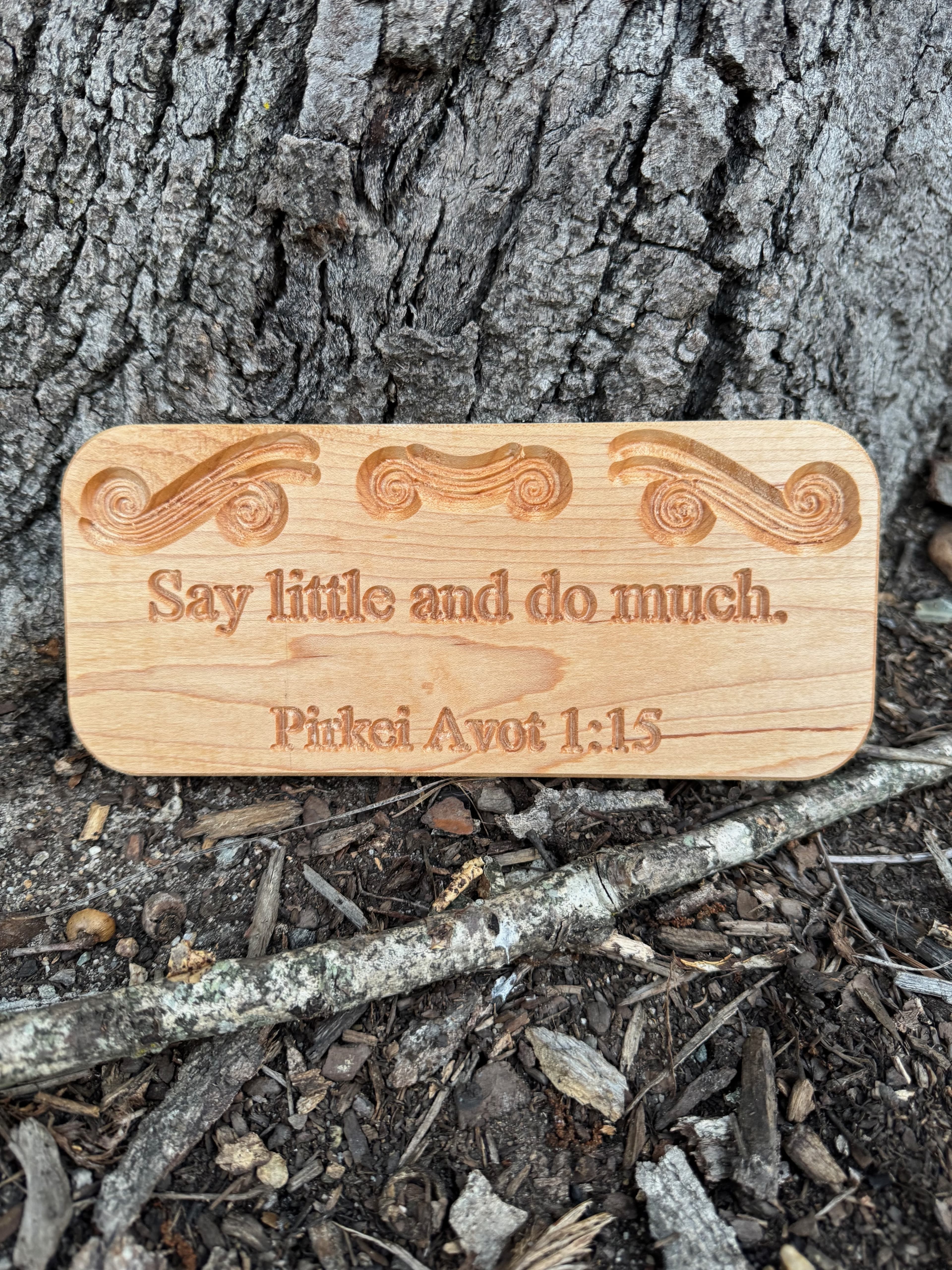 Say Little and Do Much Sign